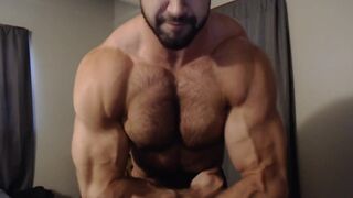 Hunk with muscles flexes his amazing body 2